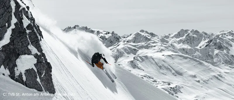 Skier in deep powder in St. Anton