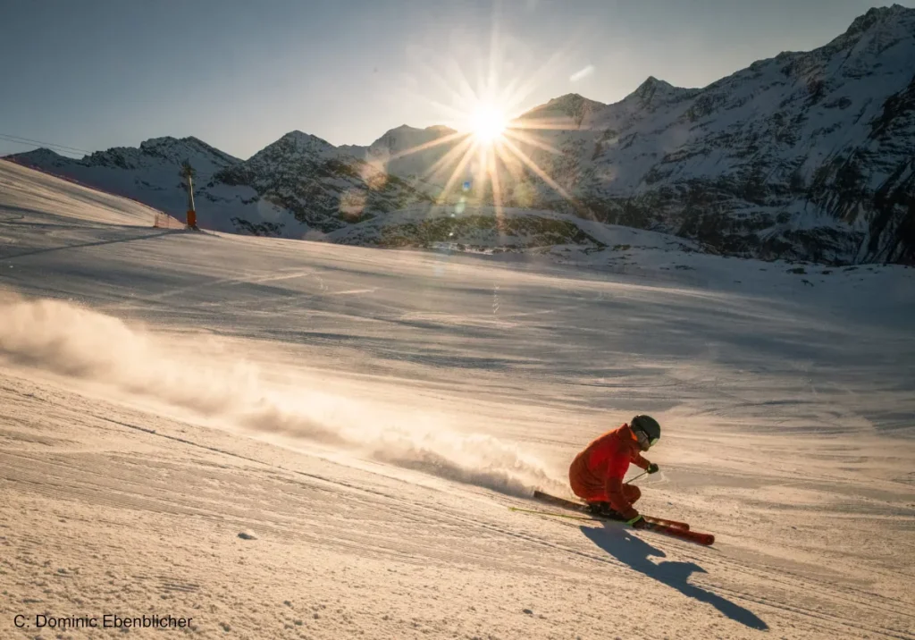 Sun setting on skier at Solden