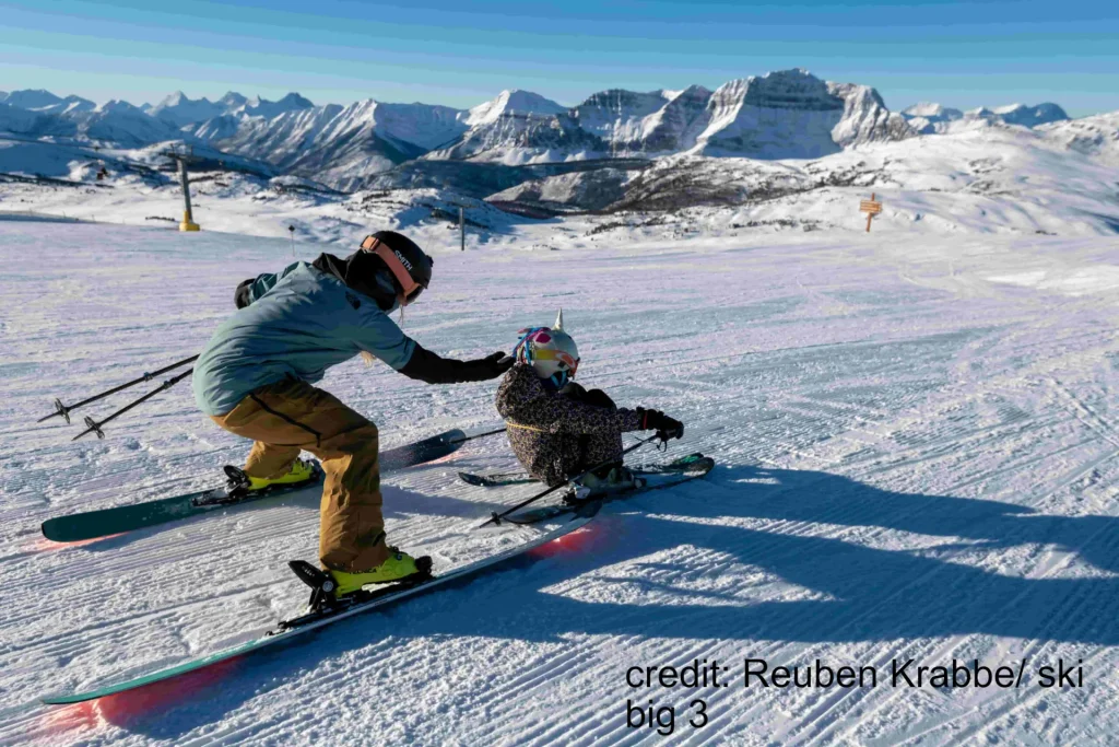 Teaching a child to ski in Banff, Alberta