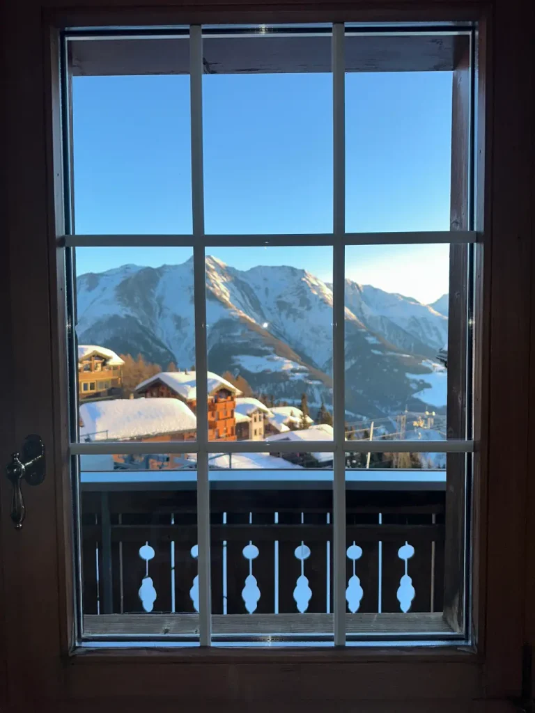 Aletsch ski area viewed through a door