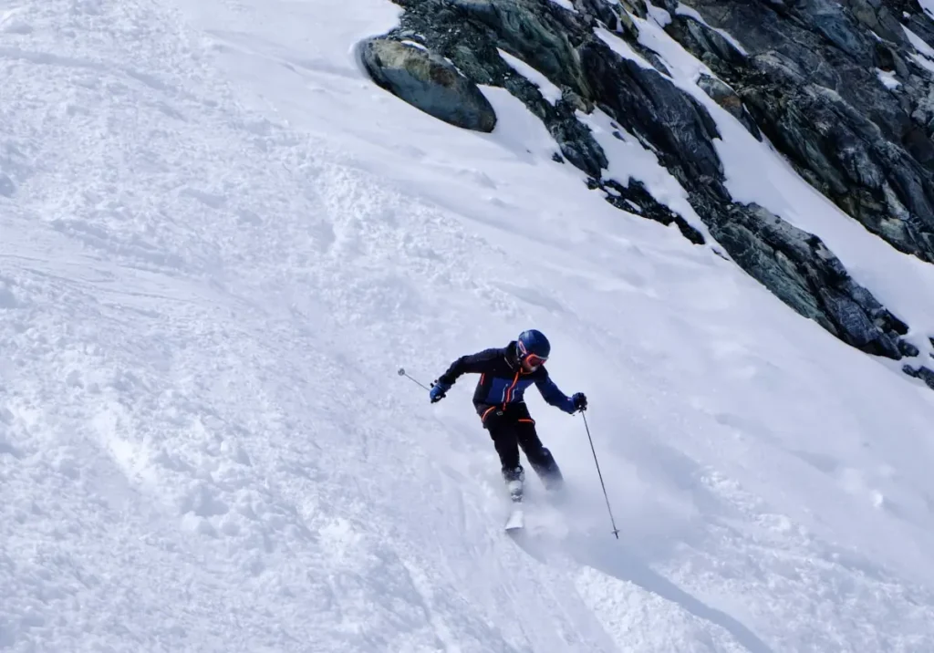 skiing a steep slope in Saas Fee