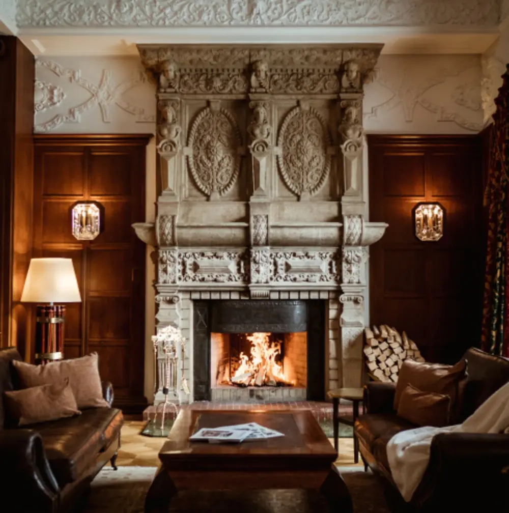 hotel_carlton_03 Carlton Hotel St. Moritz fireplace in lobby