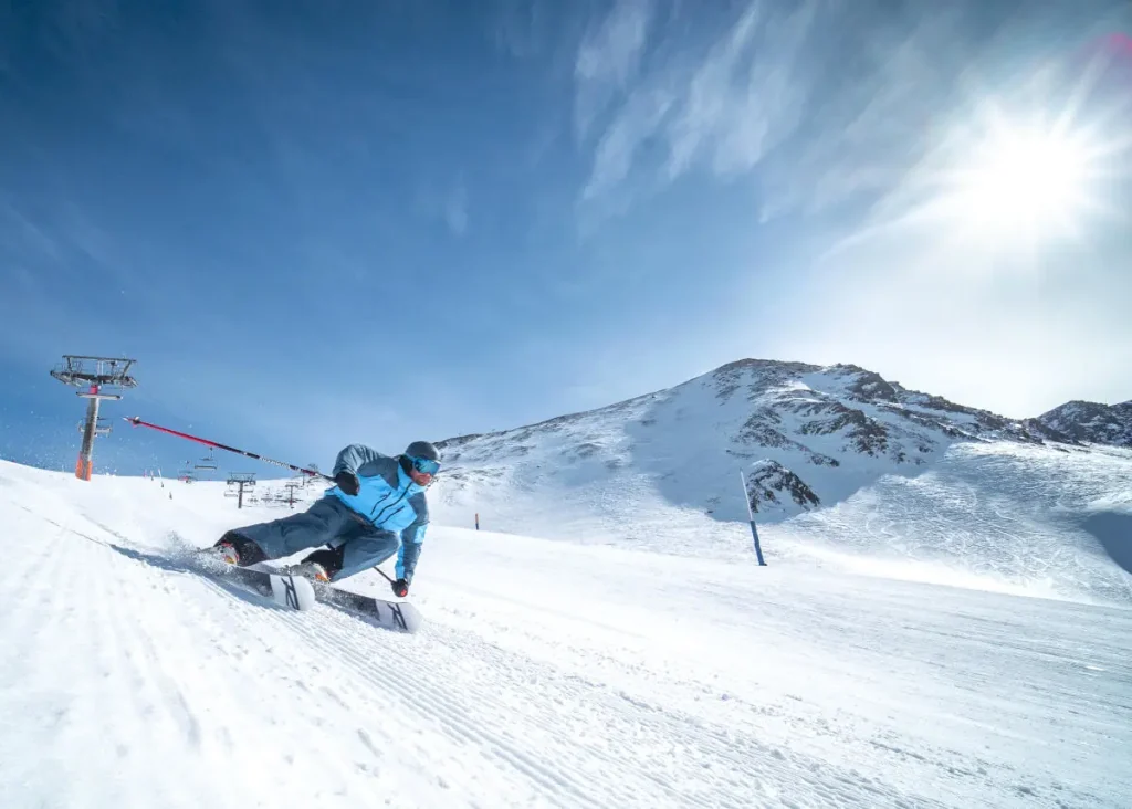 skier on a groomed run in Andorra