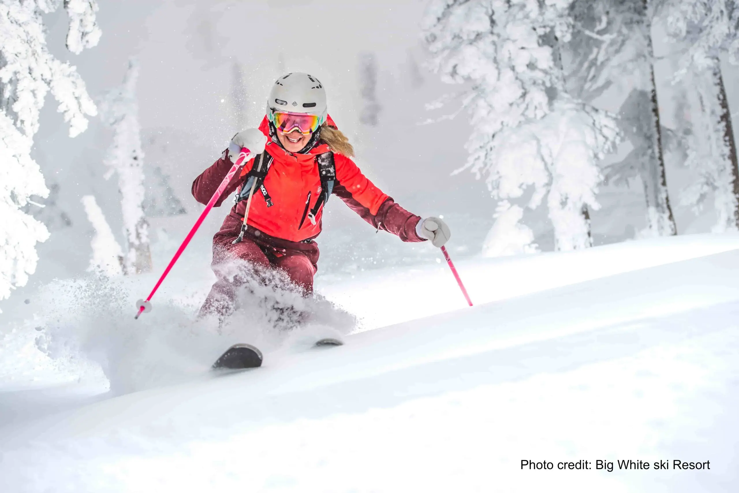 Big White 1 woman skiing deep powder at Big White Ski Resort