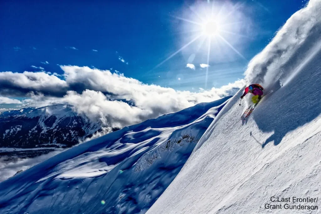 Last_Frontier 1 skier on a beautiful sunny day with Last Frontier heli skiing
