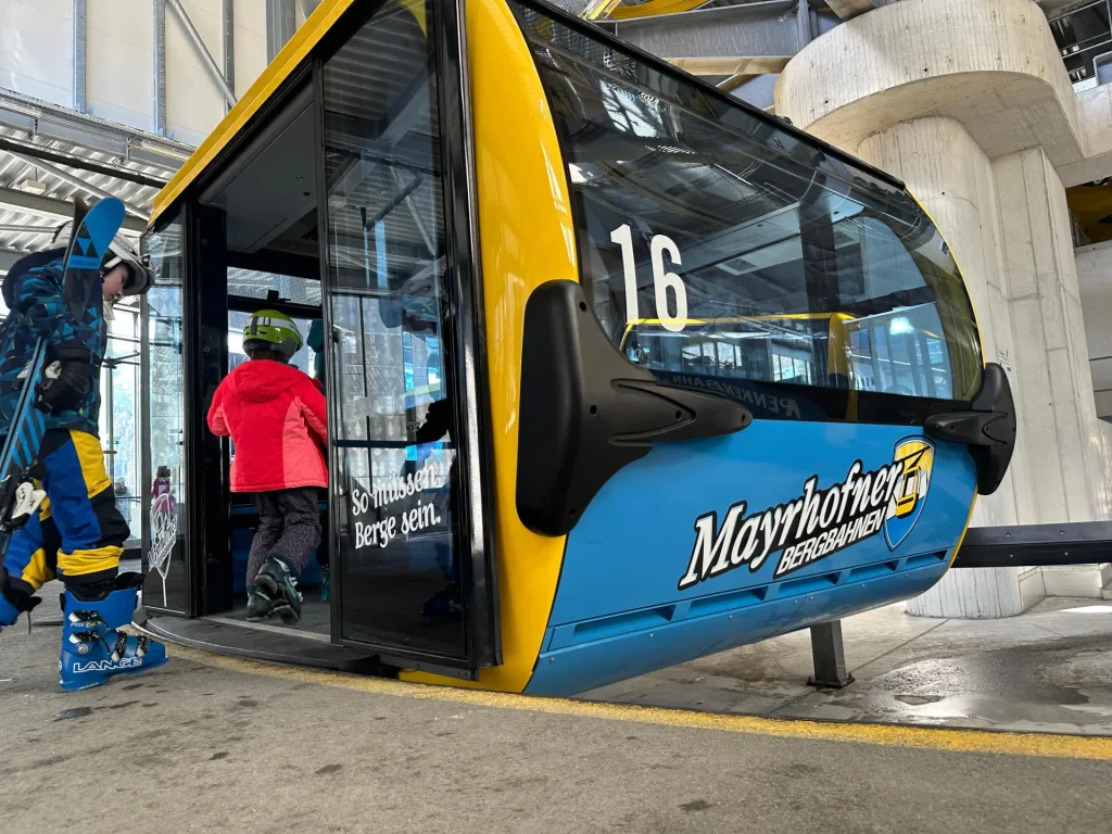 skiers boarding the gondola in Mayrhofen