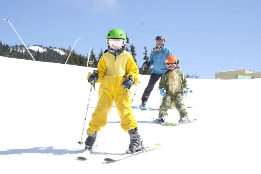 Mt Washington Resort 2 kids skiing the bunny hill at Mt. Washington Alpine Resort