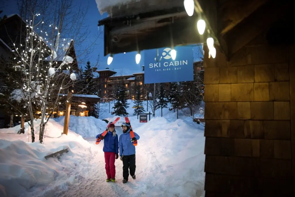 Panorama Resort 2 Skiers walking through Panorama village at night