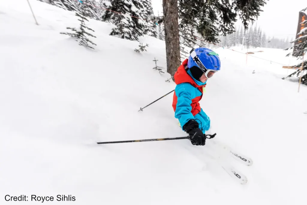 Revelstoke 4 young kid skiing powder in Revelstoke