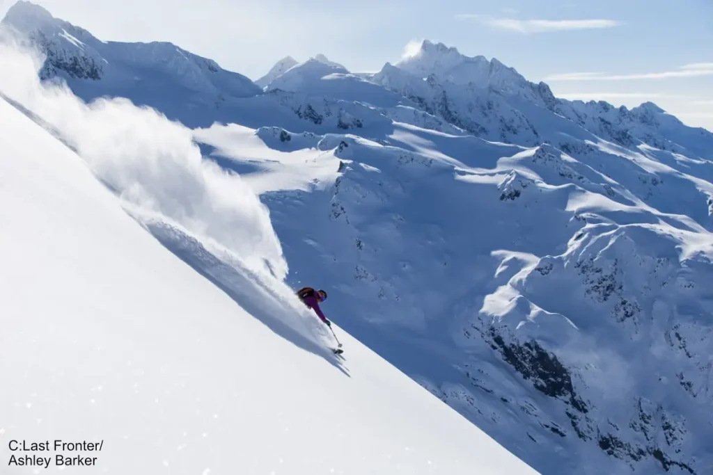 skiing steep powder with Bell Last Frontier heli skiing