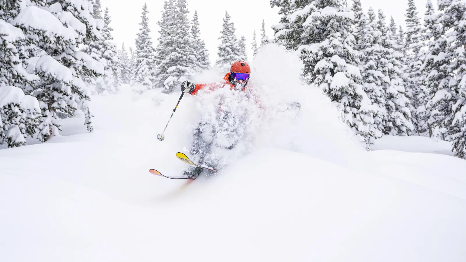 Winter Park 7 skier in deep powder at Winter Park Resort, Colorado