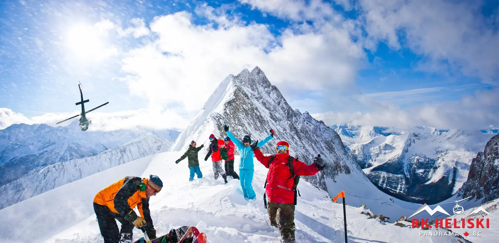 Merideths_group Heli skiers atop the mountains near Revelstoke