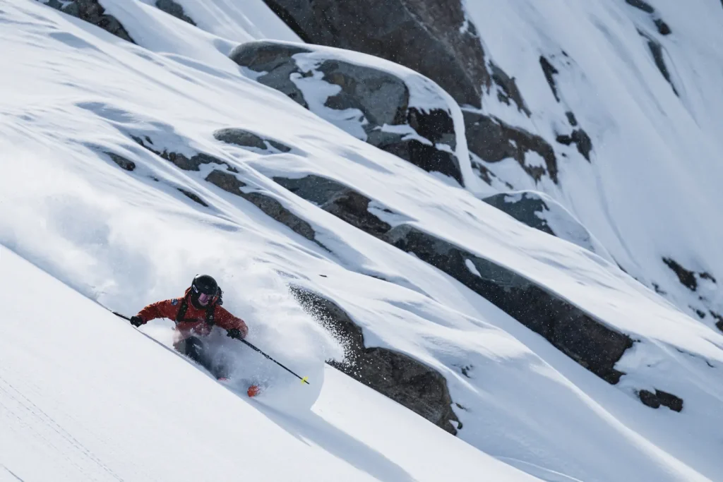 skiing steep powder near Whitecap Alpine Adventure lodge