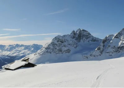 A lodge buried in snow high up in St. Moritz