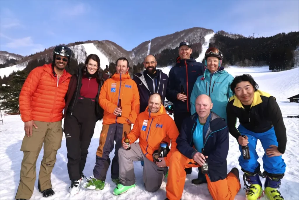 group of skiers on a Canadian Ski Vacations trip pose for a photo