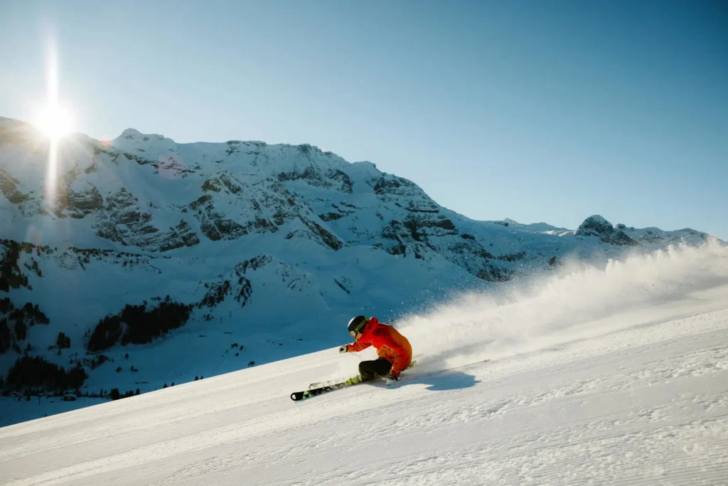 skier carving a turn on a groomed run in Adelboden
