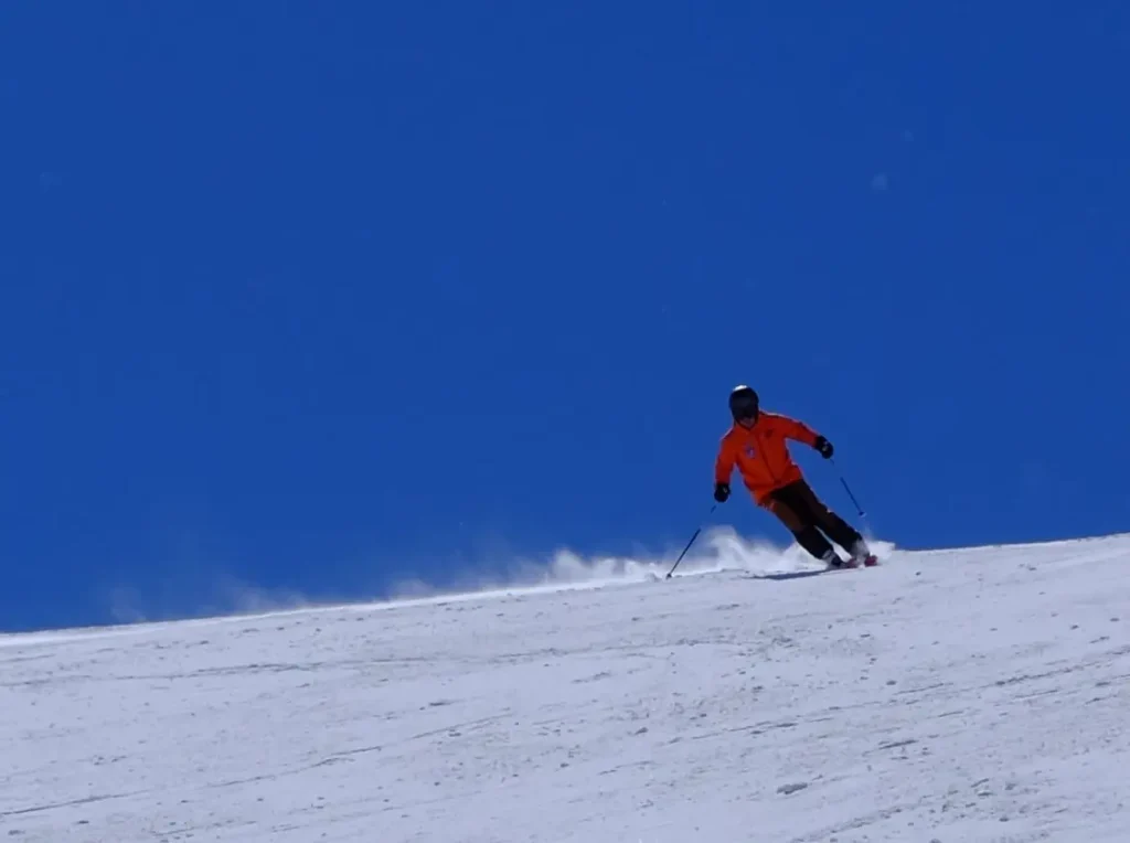 skier on a groomed run in Val Disere