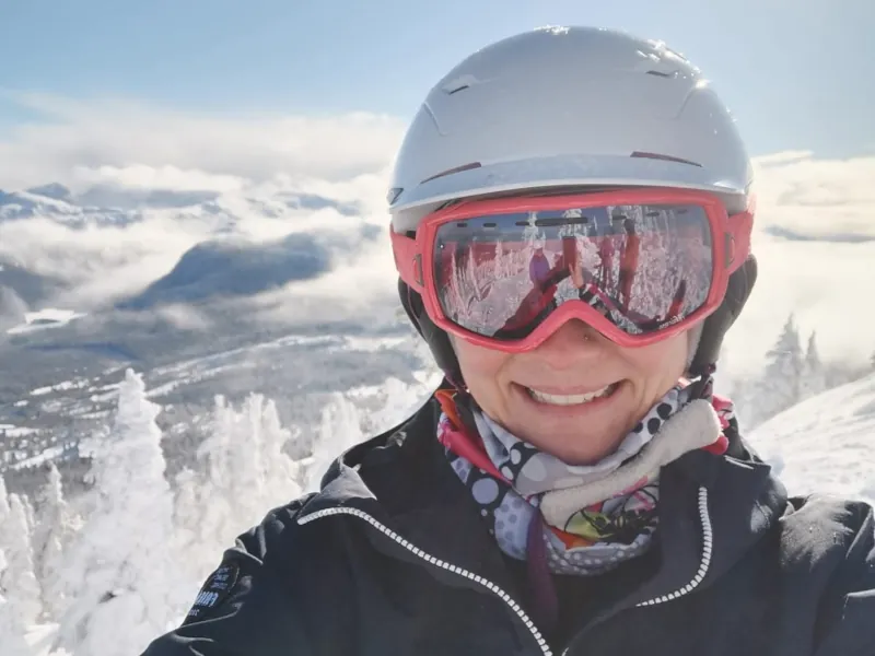 Leah in her ski gear on a sunny day